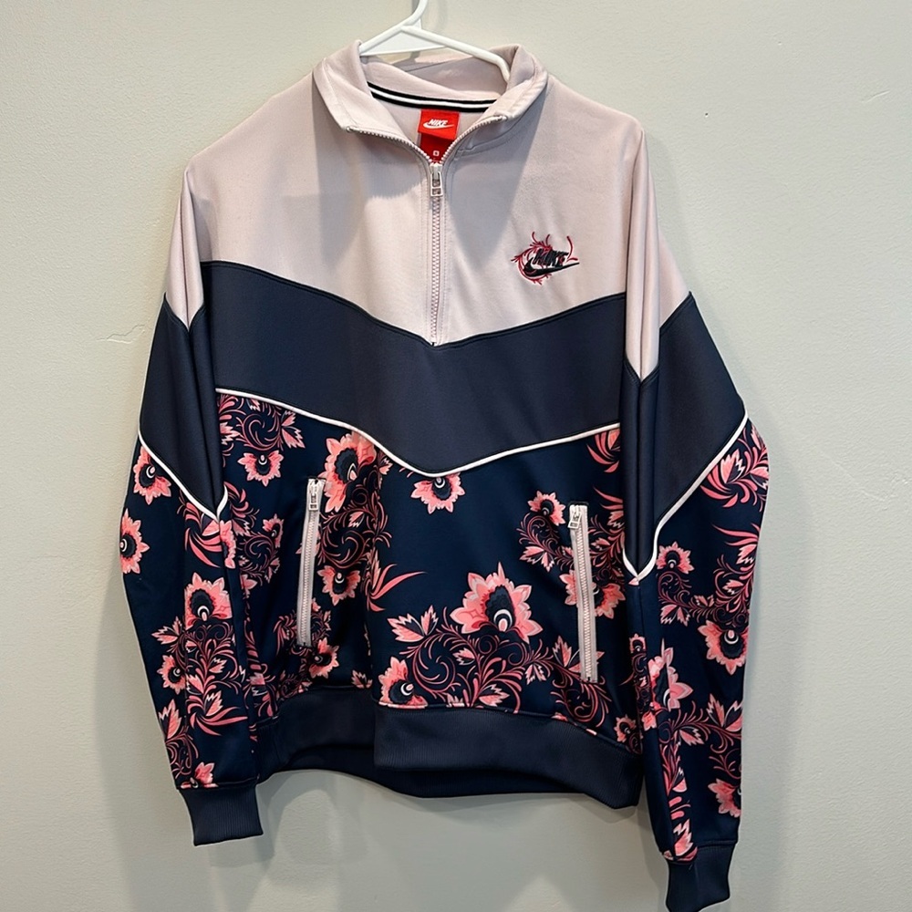 Nike pullover jacket. Size S. Navy and floral pattern.